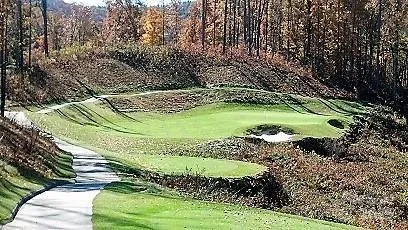 a view of a street with a building in the background