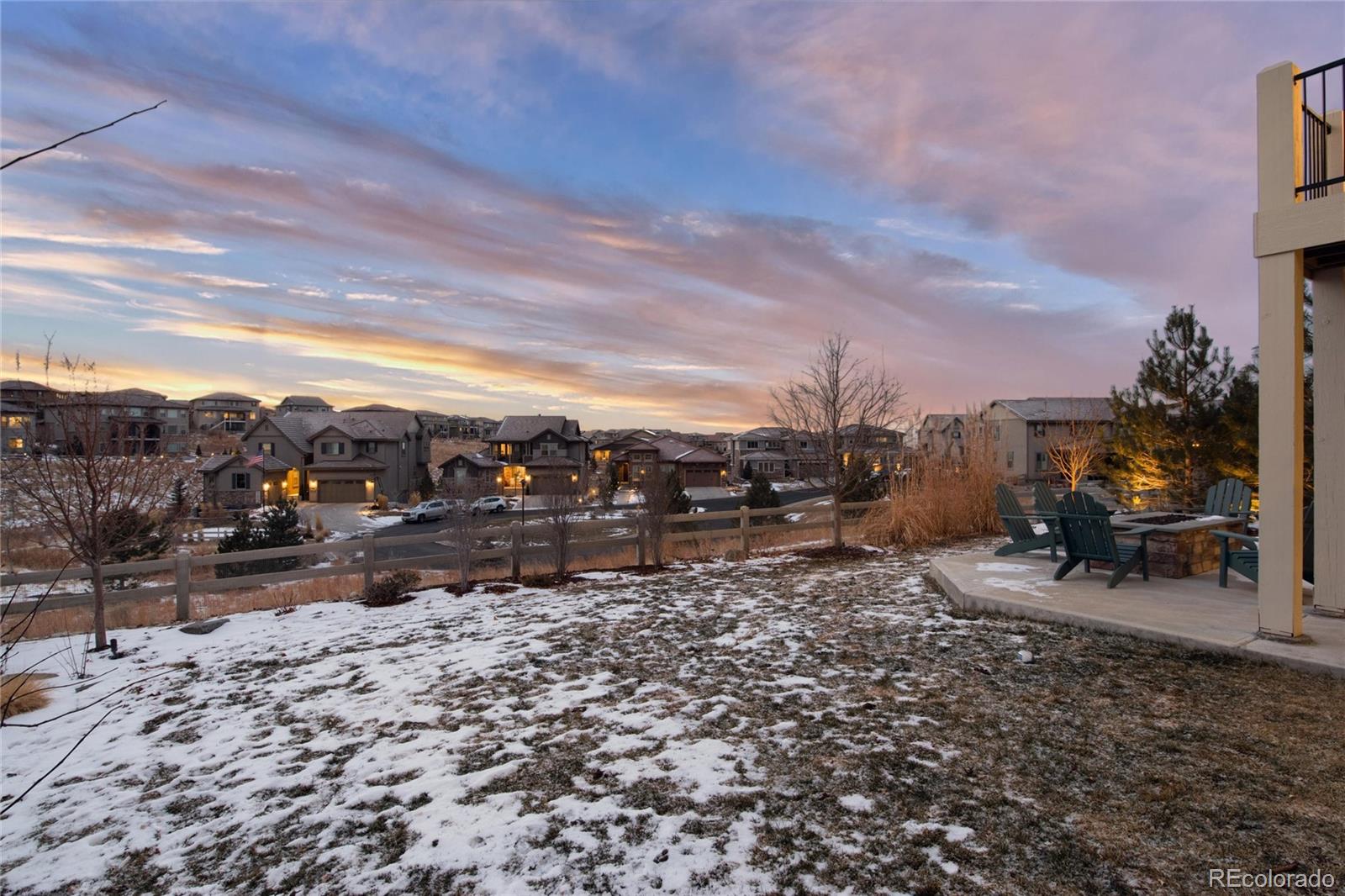 10841 Greycliffe Drive Highlands Ranch, CO 80126 - Photo 24 of 25 a view of a dry yard with wooden fence