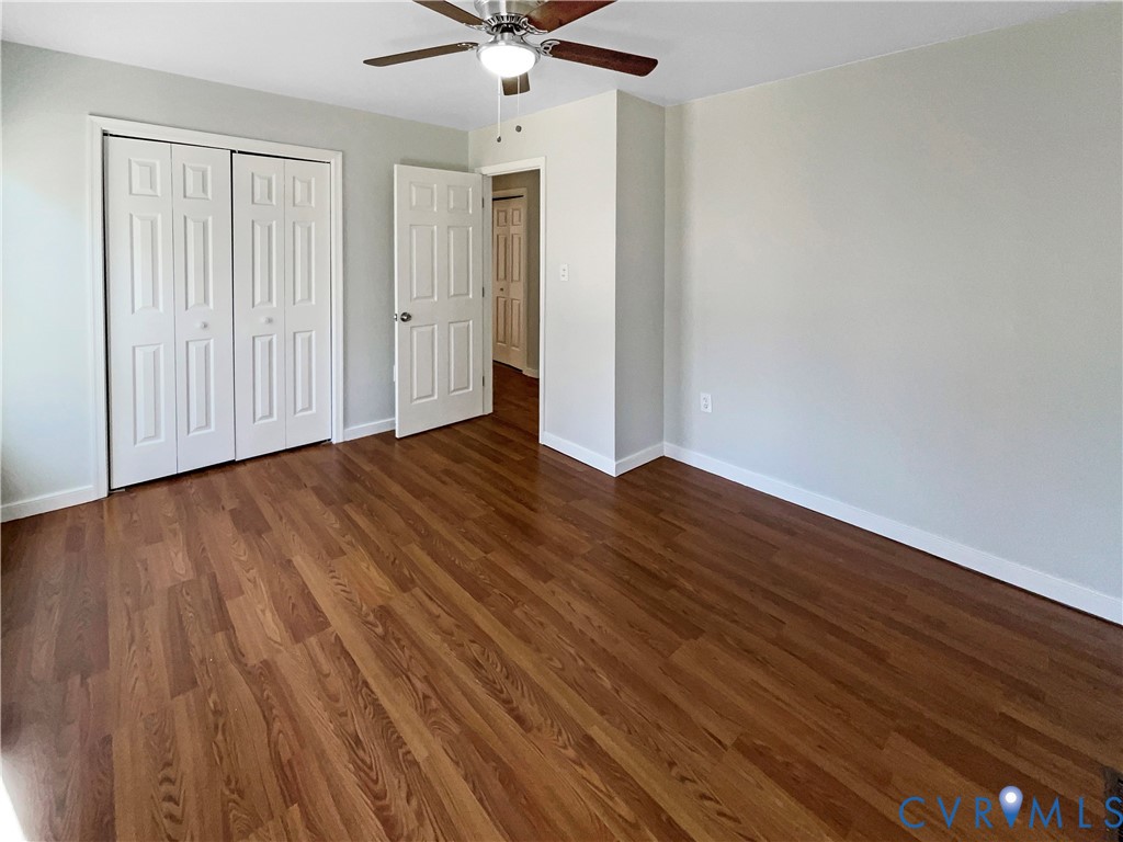 5614 Chatmoss Road Midlothian, VA 23112 - Photo 19 of 25 a view of an empty room with wooden floor