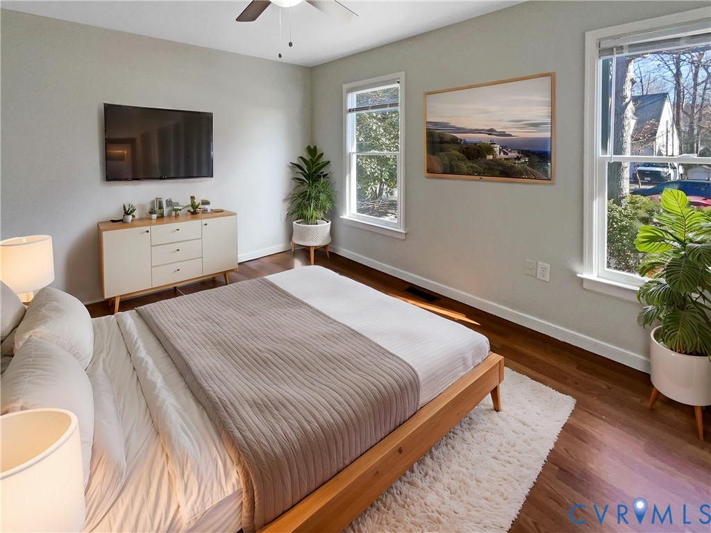 5614 Chatmoss Road Midlothian, VA 23112 - Photo 4 of 25 a bedroom with a bed and a flat screen tv