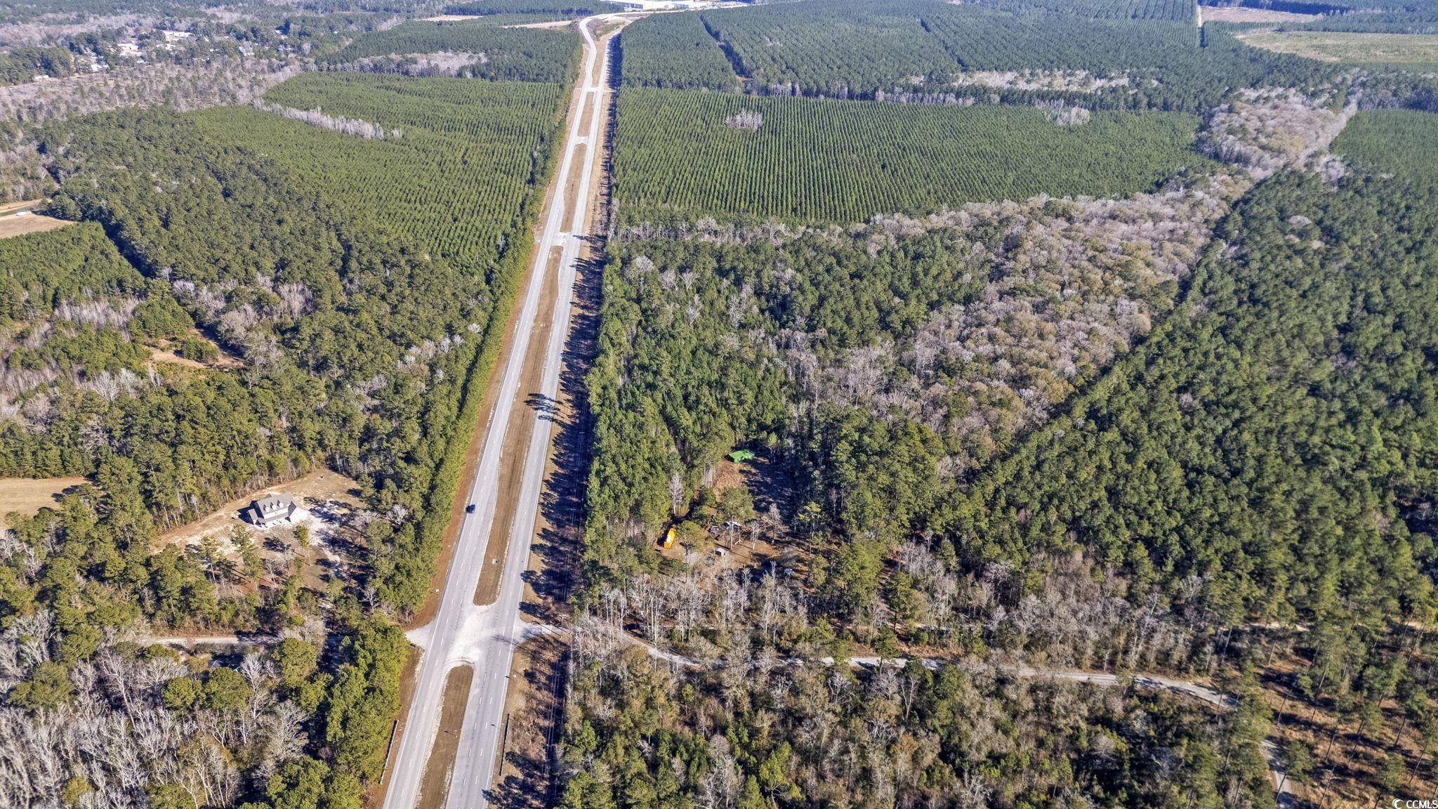 705 Catclaw Road Andrews, SC 29510 - Photo 11 of 26 Birds eye view of property featuring a rural view