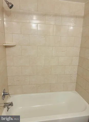 a bathroom with a bathtub