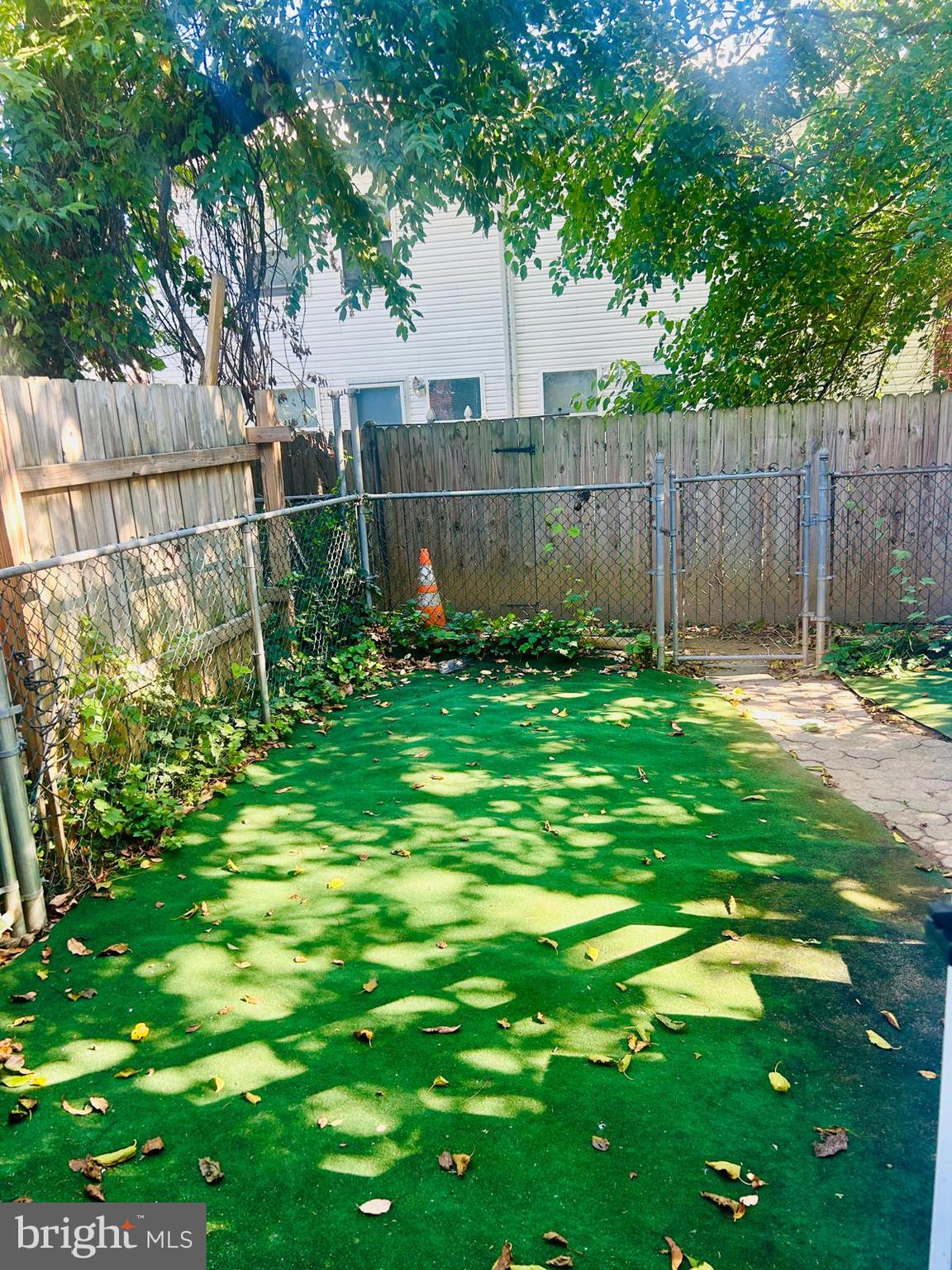 9455 Fairgreen Lane Philadelphia, PA 19114 - Photo 10 of 10 a garden with trees in front of it