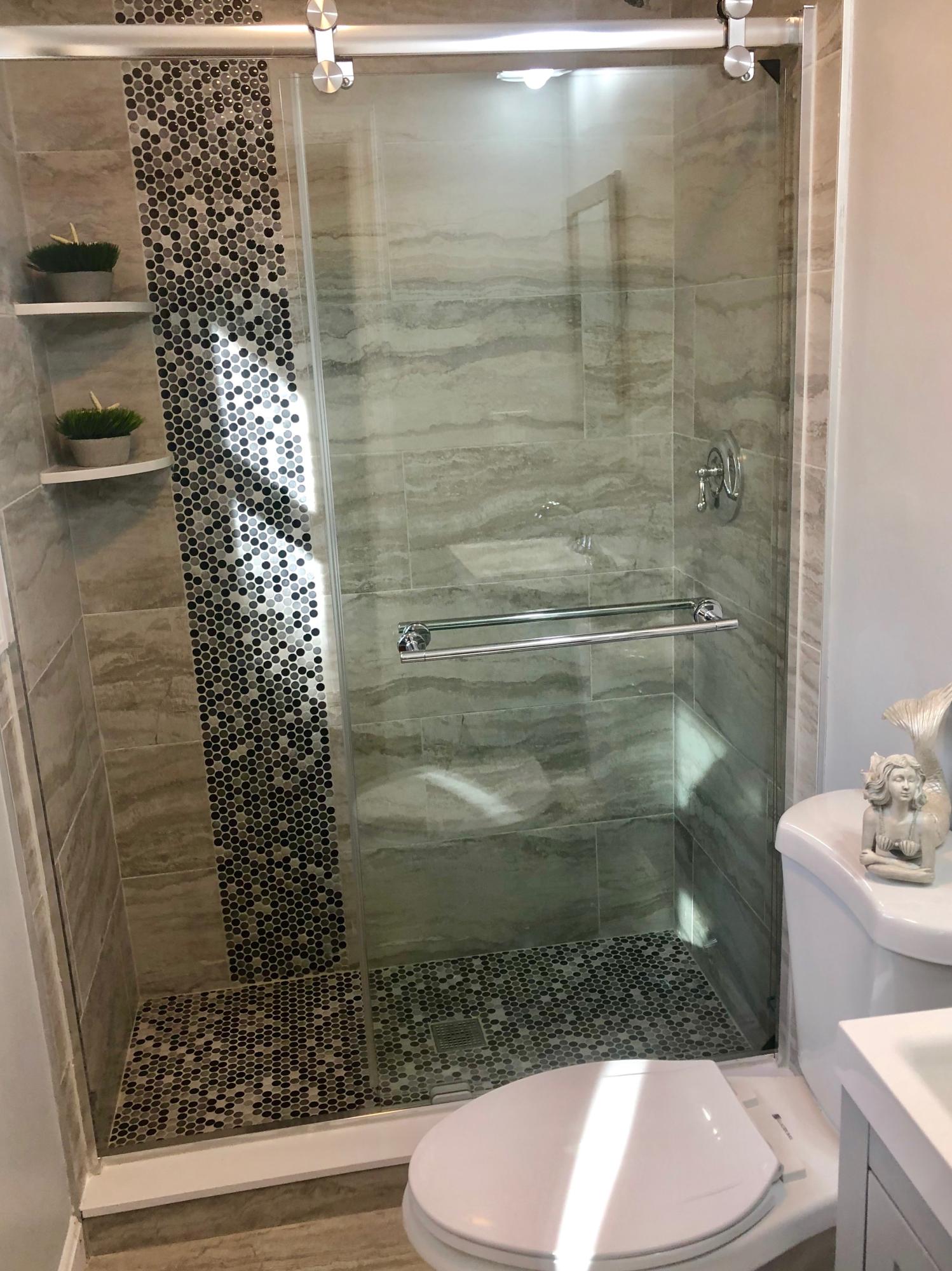 57 Stage Coach Road Centerville, MA 02632 - Photo 24 of 34 a bathroom with a toilet and a shower