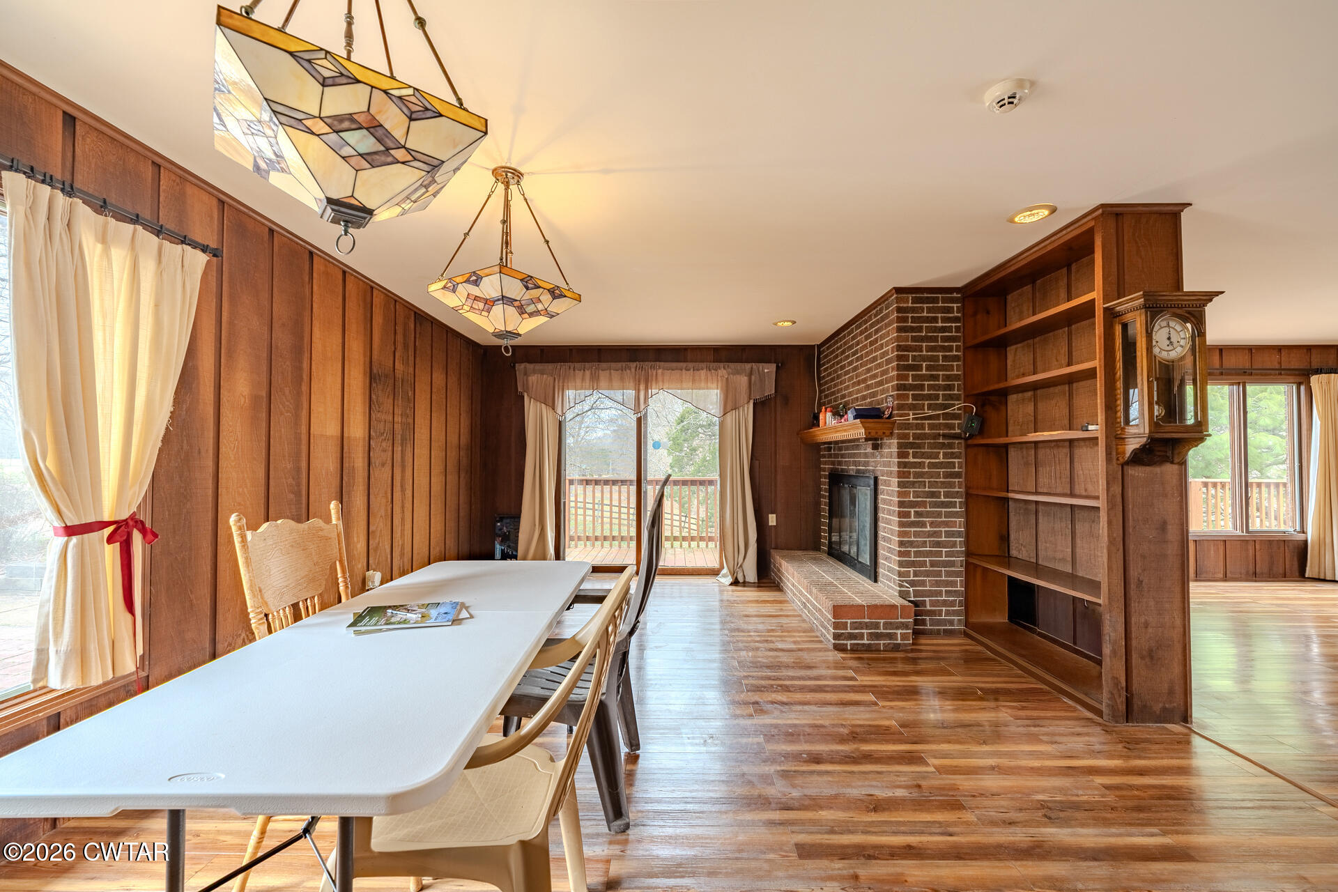 428 Gwin Cemetery Road Waverly, TN 37185 - Photo 12 of 50 a view of a dining room with furniture window and wooden floor