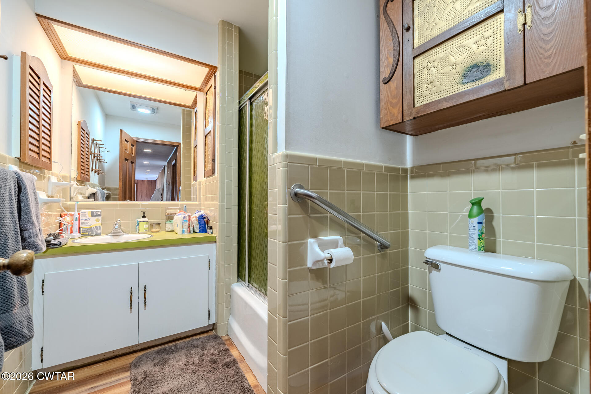 428 Gwin Cemetery Road Waverly, TN 37185 - Photo 23 of 50 a bathroom with a toilet a sink and mirror