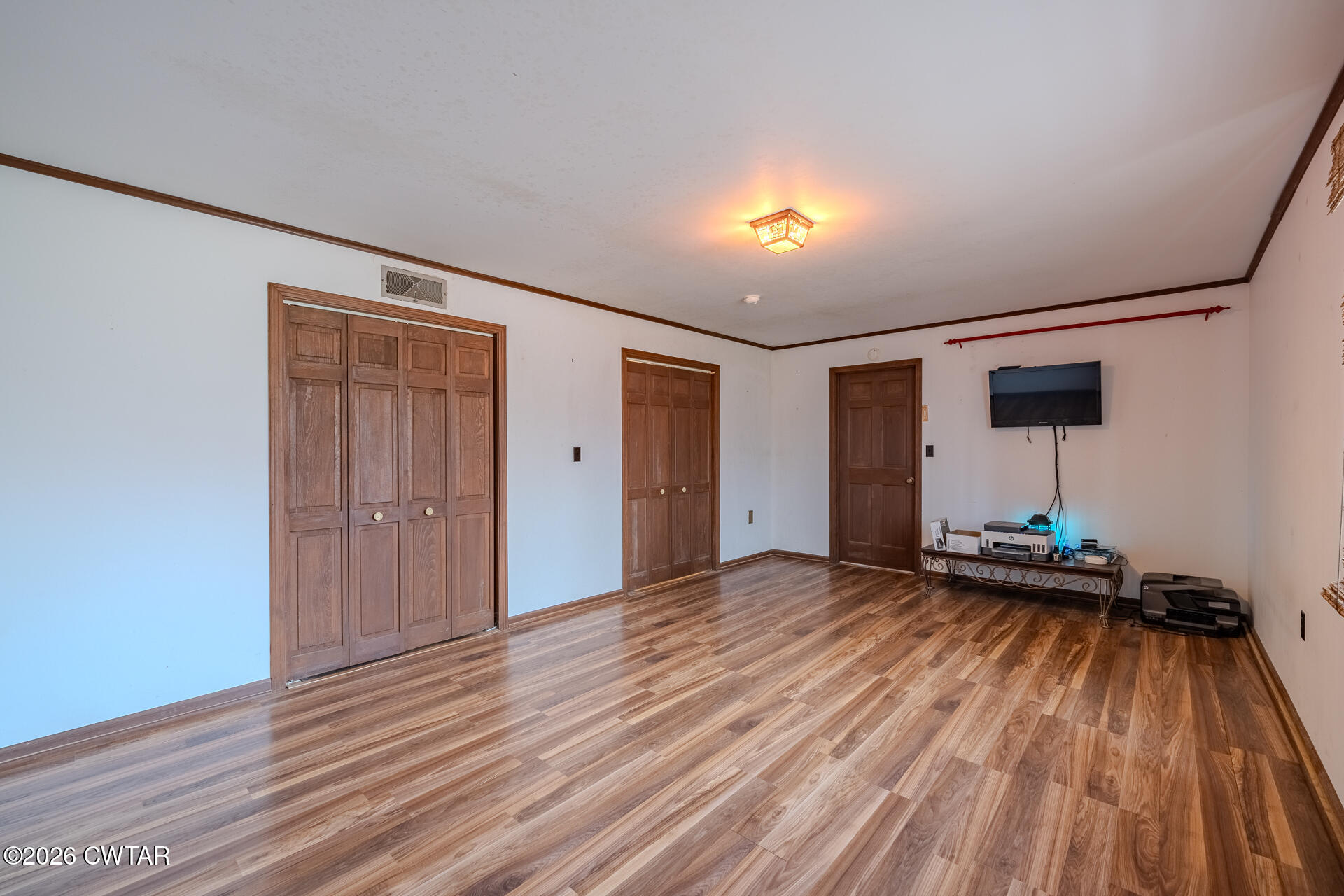 428 Gwin Cemetery Road Waverly, TN 37185 - Photo 29 of 50 a view of a room with wooden floor and window