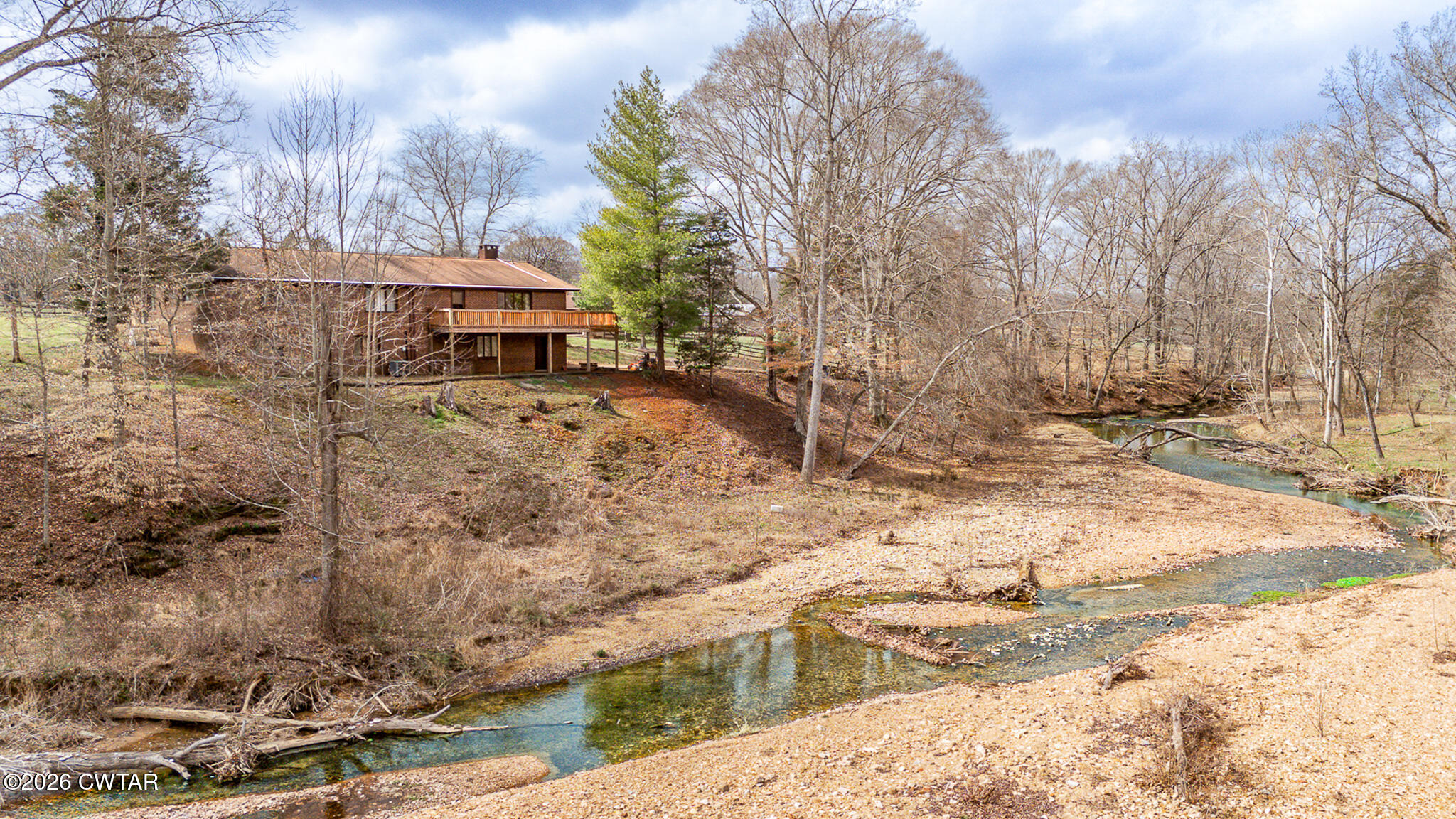 428 Gwin Cemetery Road Waverly, TN 37185 - Photo 43 of 50 a view of a yard covered with snow