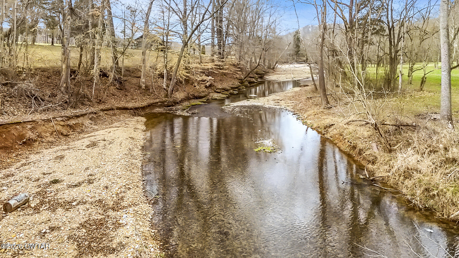 428 Gwin Cemetery Road Waverly, TN 37185 - Photo 44 of 50 a view of swimming pool of water with outdoor seating