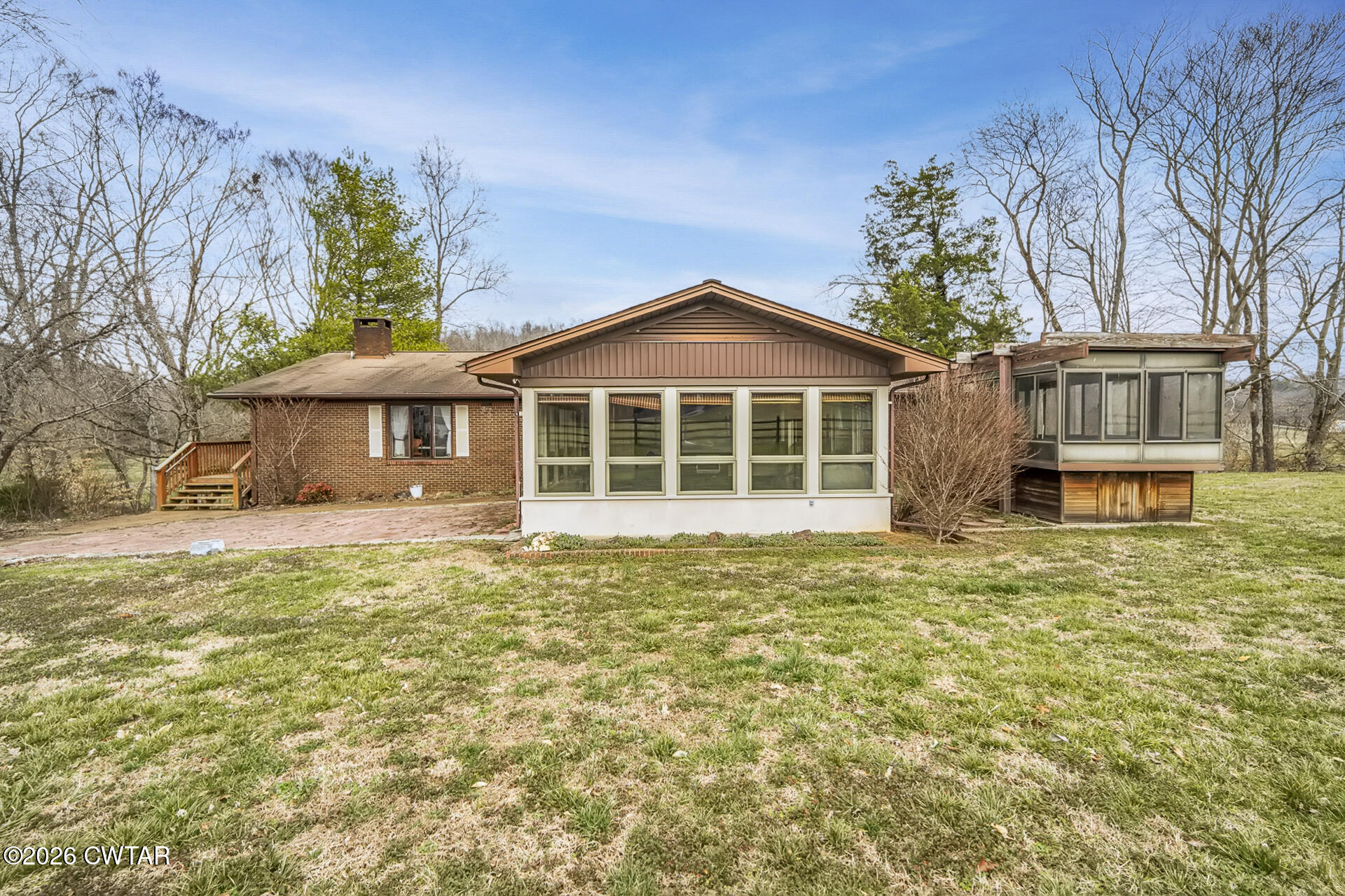 428 Gwin Cemetery Road Waverly, TN 37185 - Photo 6 of 50 a front view of a house with a garden