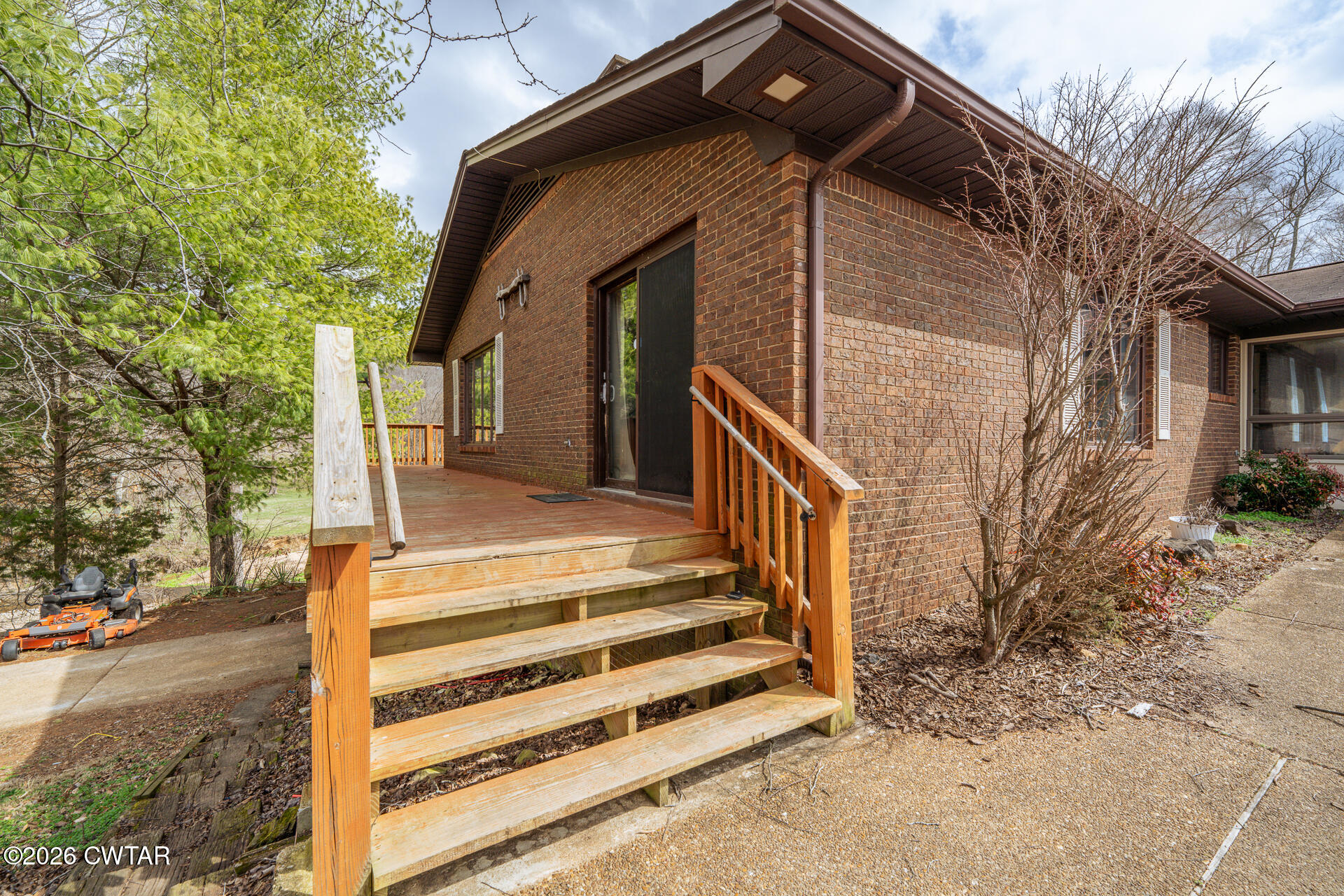 428 Gwin Cemetery Road Waverly, TN 37185 - Photo 7 of 50 a view of a house with wooden fence and two windows