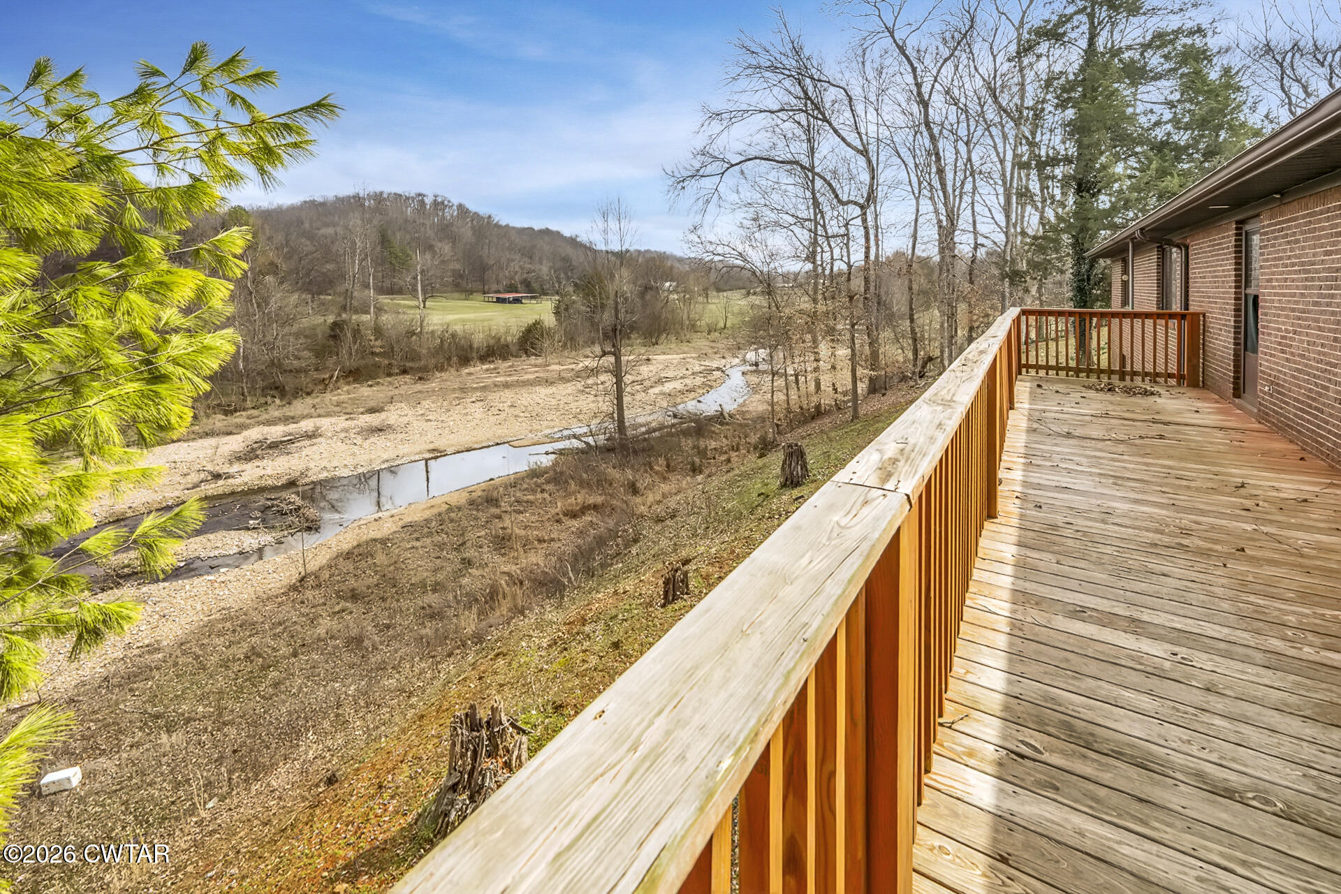 428 Gwin Cemetery Road Waverly, TN 37185 - Photo 8 of 50 a view of mountain with wooden deck