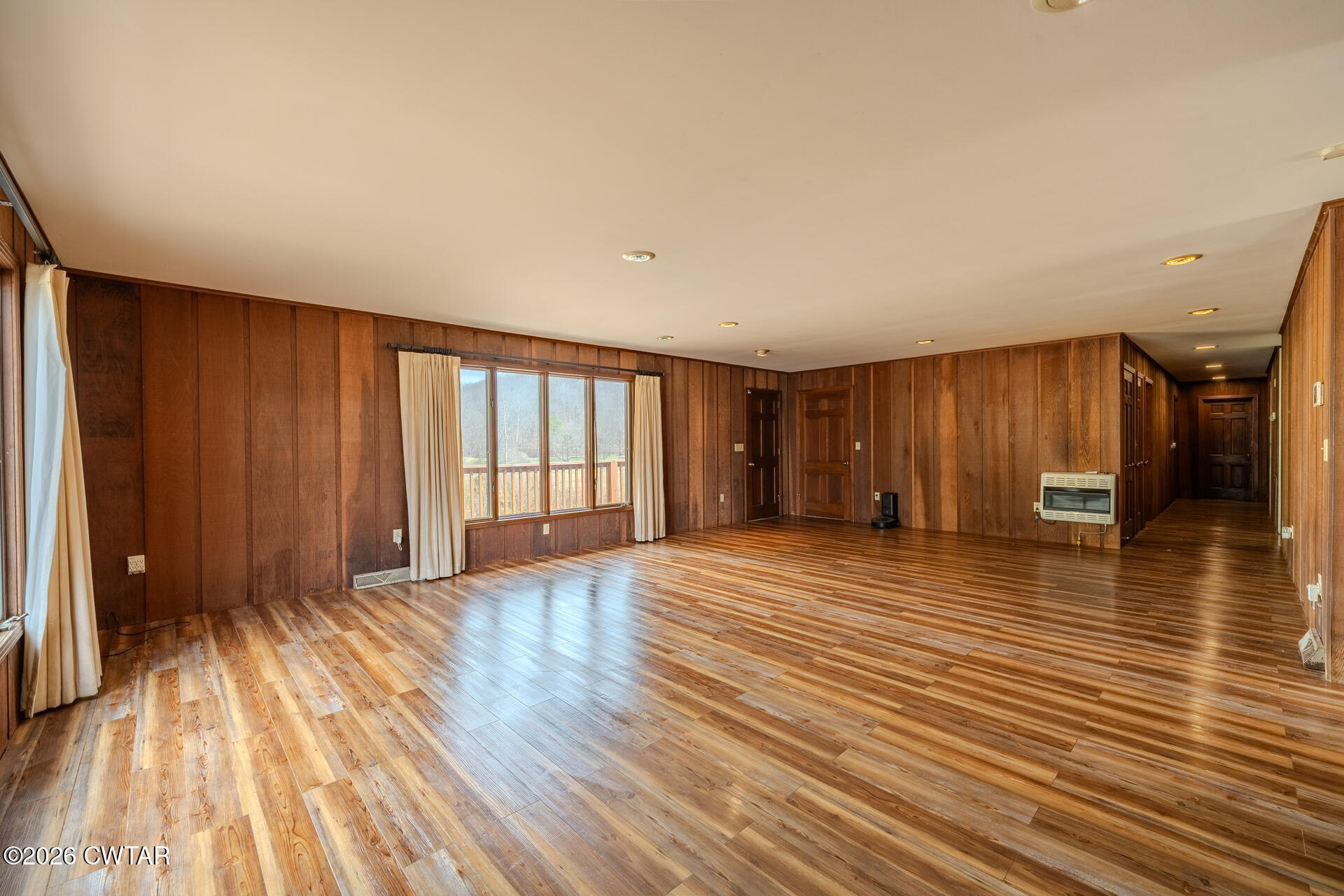 428 Gwin Cemetery Road Waverly, TN 37185 - Photo 10 of 50 a view of a room with wooden floor and stairs
