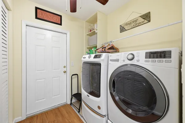 a view of a storage & utility room with washer and dryer