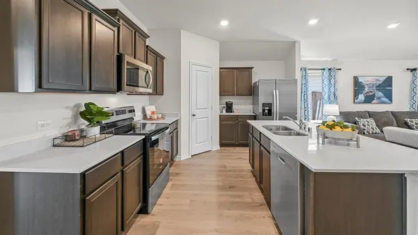 a view of storage and utility room with washer and dryer