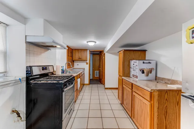 $443,000 | 7408 West Addison Street, Chicago, IL 60634