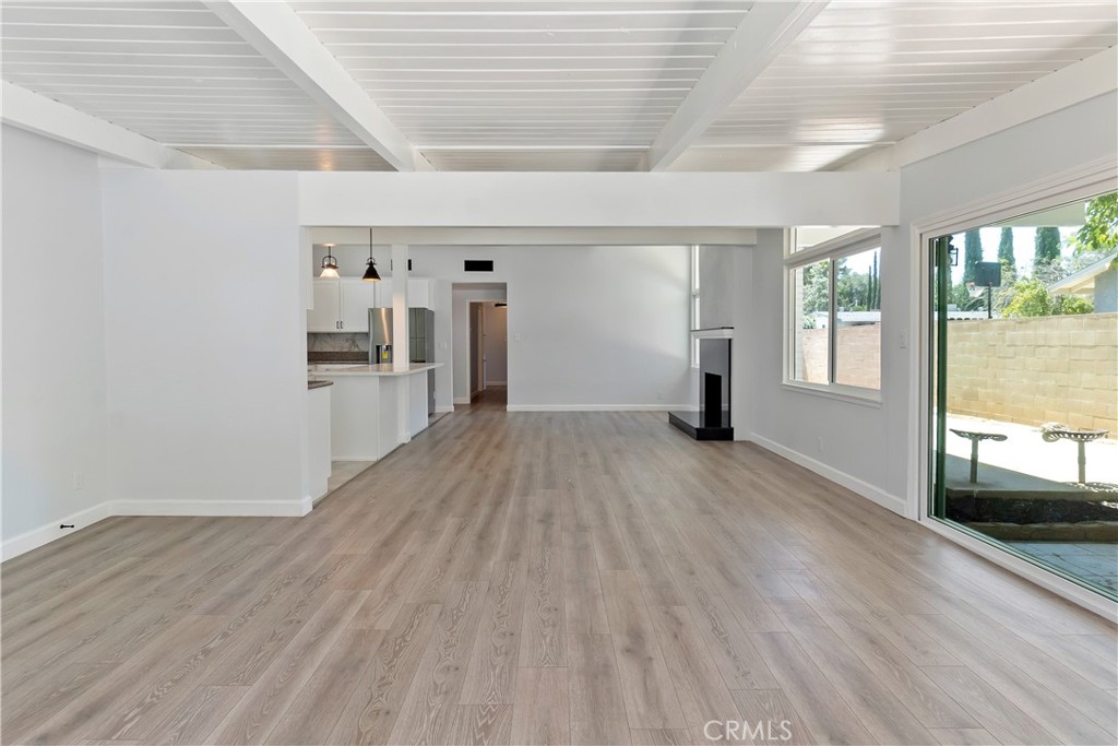 38995 Juniper Tree Road Palmdale, CA 93551 - Photo 17 of 22 a view of a room with wooden floor