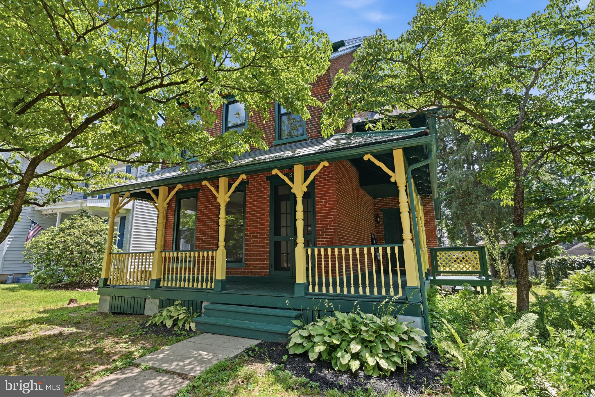 124 Cedar Road Riegelsville, PA 18077 - Photo 2 of 50 Charming brick home with vibrant porch.