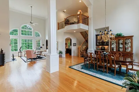 a view of a dining room with furniture window and outside view