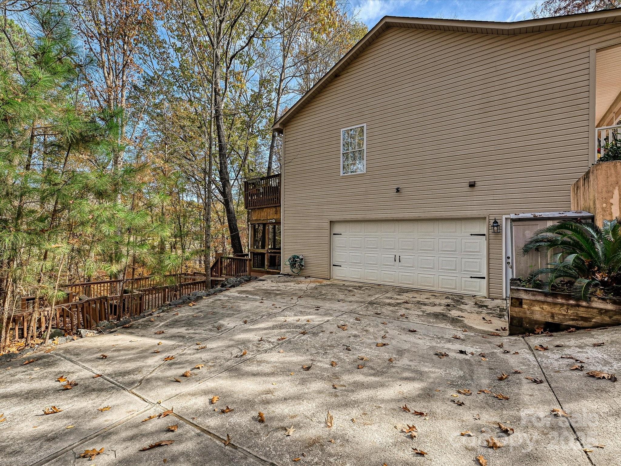 25040 Timberlake Drive Tega Cay, SC 29708 - Photo 37 of 40 a front view of a house with garden