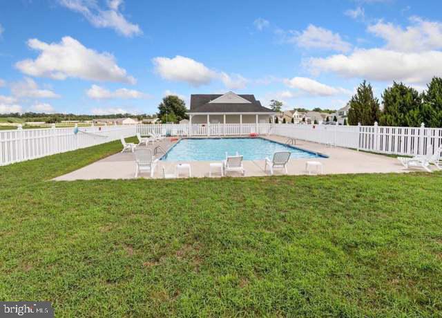 108 Bobbys Branch Road Millsboro, DE 19966 - Photo 12 of 13 Sunny oasis with inviting poolside.