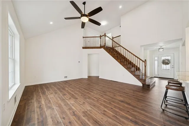 a view of an entryway with wooden floor