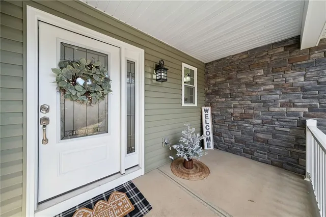 a view of a porch with seating space