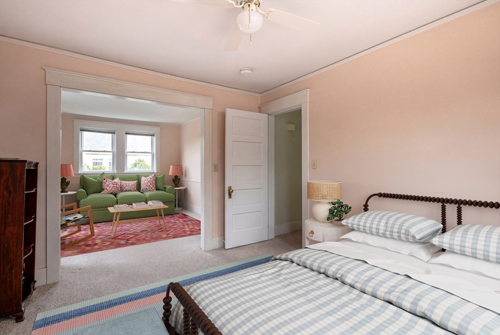 329 Front Street Marion, MA 02738 - Photo 36 of 42 a bedroom with a bed and a mirror