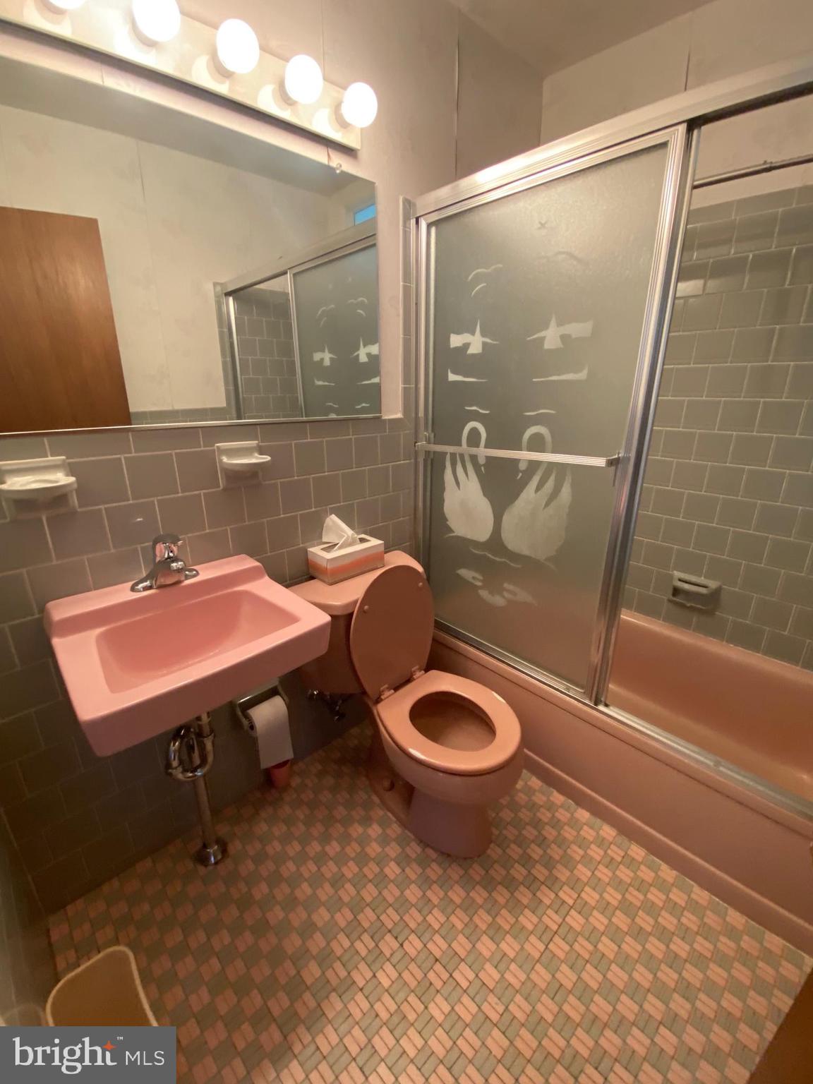 123 Cornwall Drive Chalfont, PA 18914 - Photo 17 of 37 a bathroom with a sink a toilet and a mirror