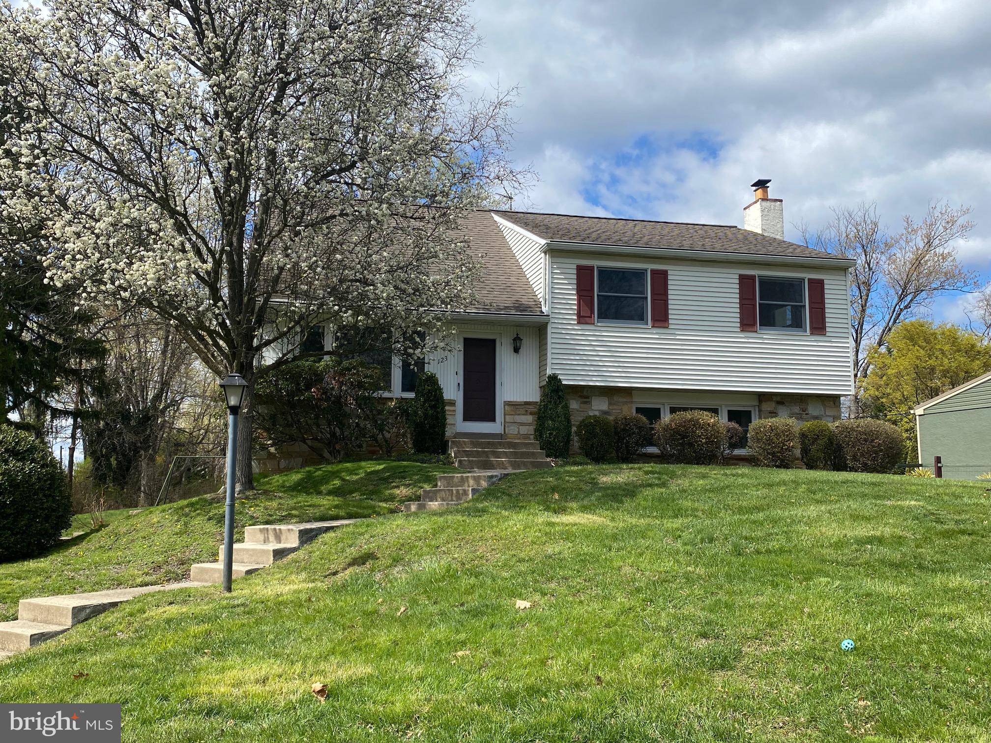 123 Cornwall Drive Chalfont, PA 18914 - Photo 2 of 37 a view of a house with a yard