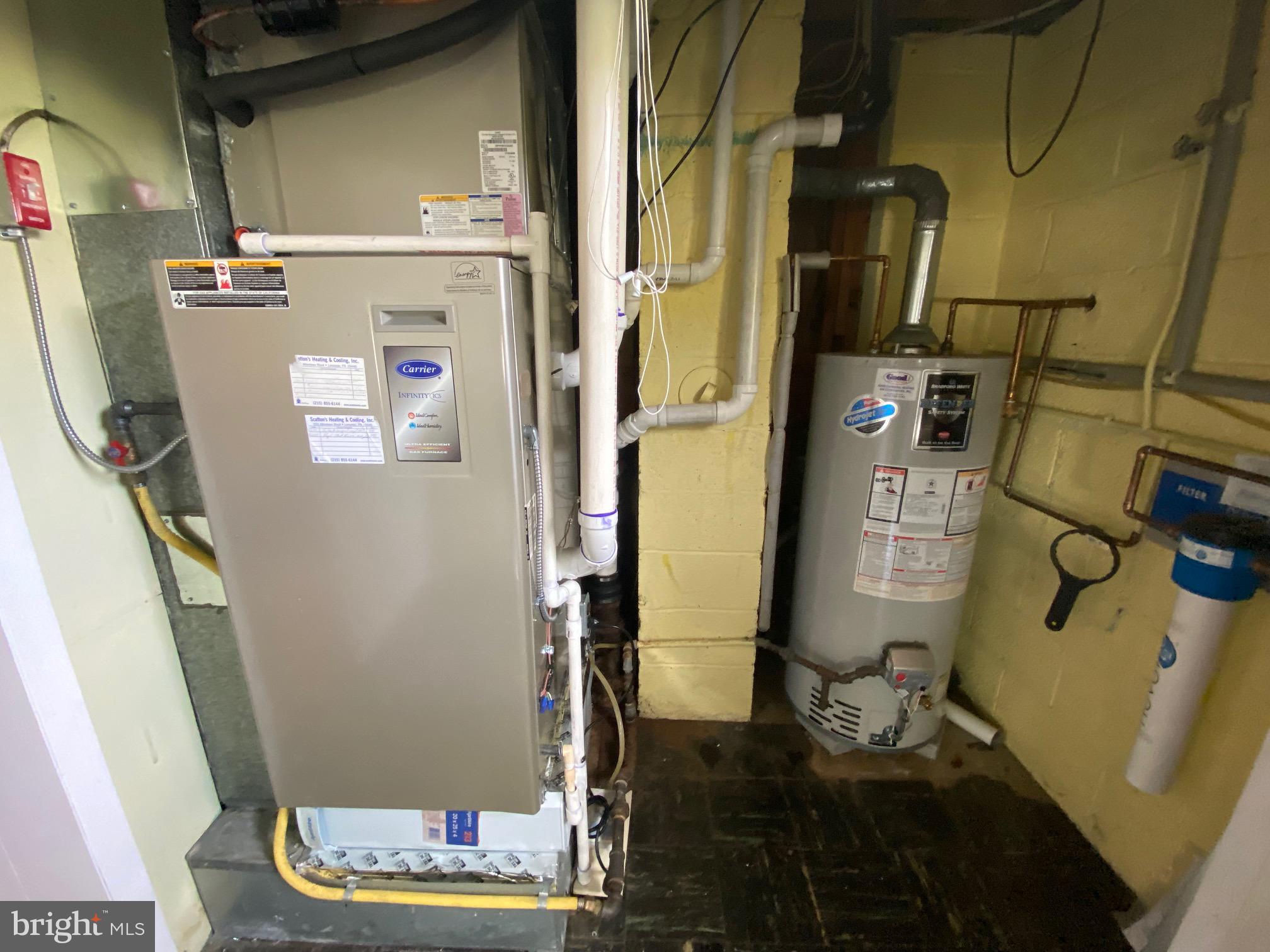 123 Cornwall Drive Chalfont, PA 18914 - Photo 26 of 37 a room with water heater refrigerator