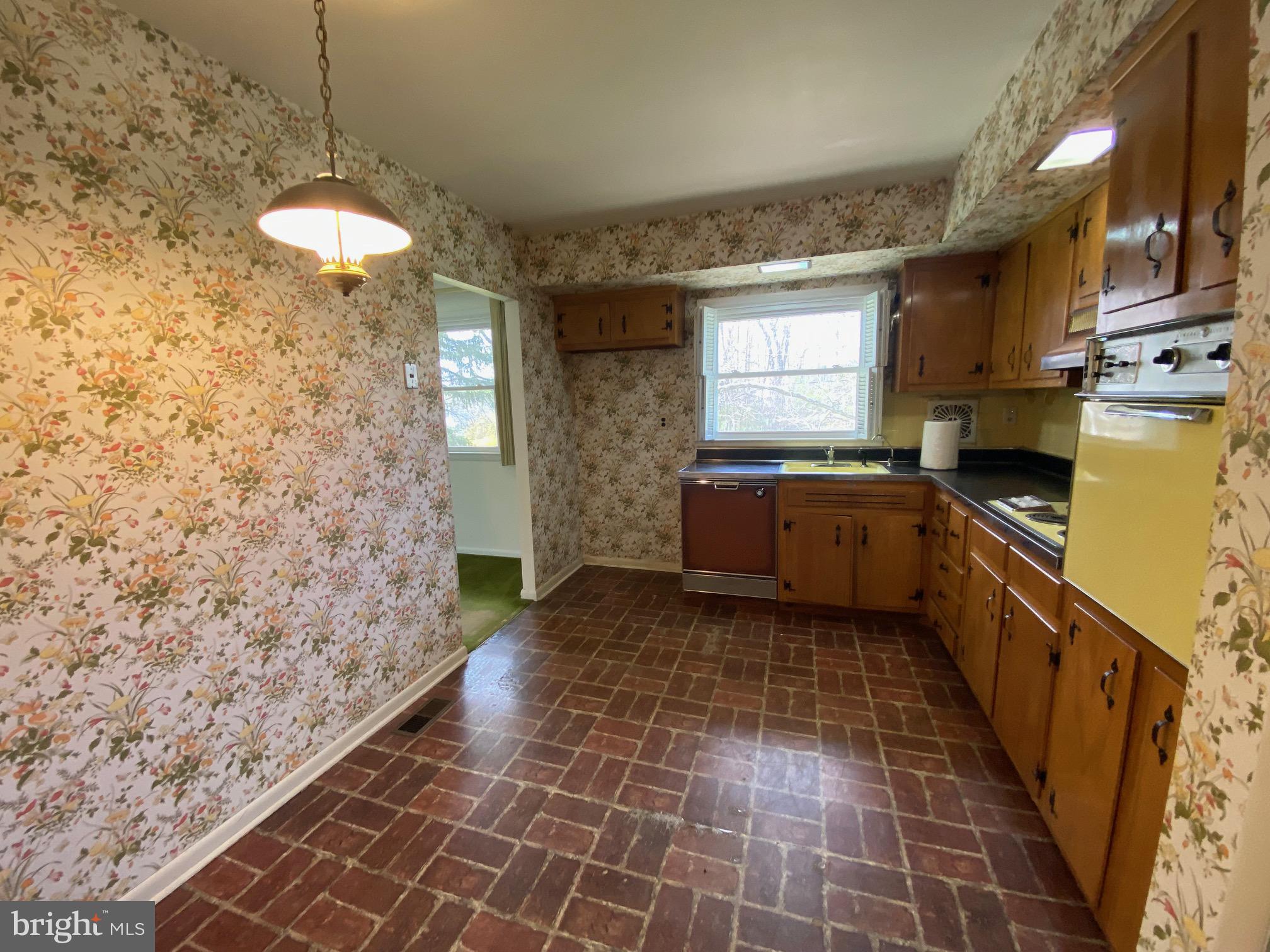 123 Cornwall Drive Chalfont, PA 18914 - Photo 8 of 37 a kitchen with stainless steel appliances granite countertop a sink stove and cabinets