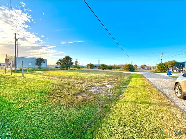 a view of a swimming pool and an outdoor space