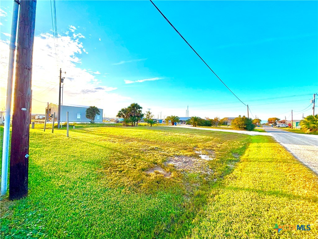 202 5th Street Port O'Connor, TX 77982 - Photo 10 of 13 a view of an ocean with a big yard