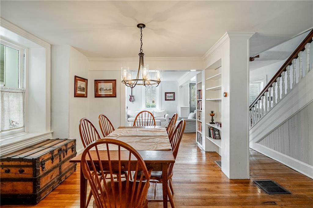 701 Oakbourne Road West Chester, PA 19382 - Photo 13 of 50 a view of a dining room with furniture window and wooden floor
