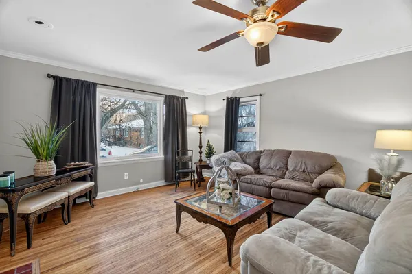 a living room with furniture and a window