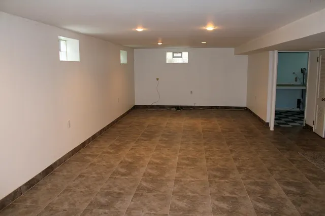 an empty room with an entryway