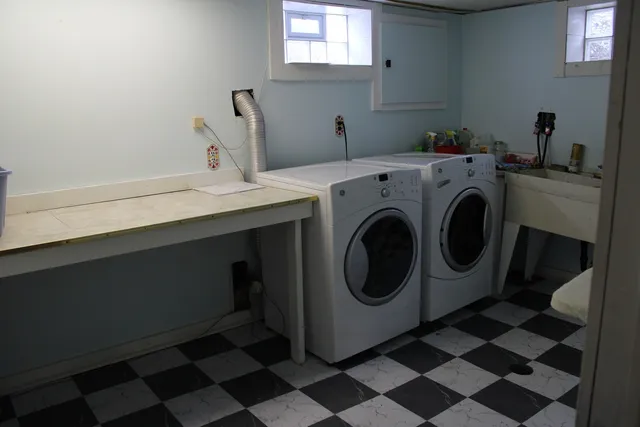 a utility room with dryer and washer