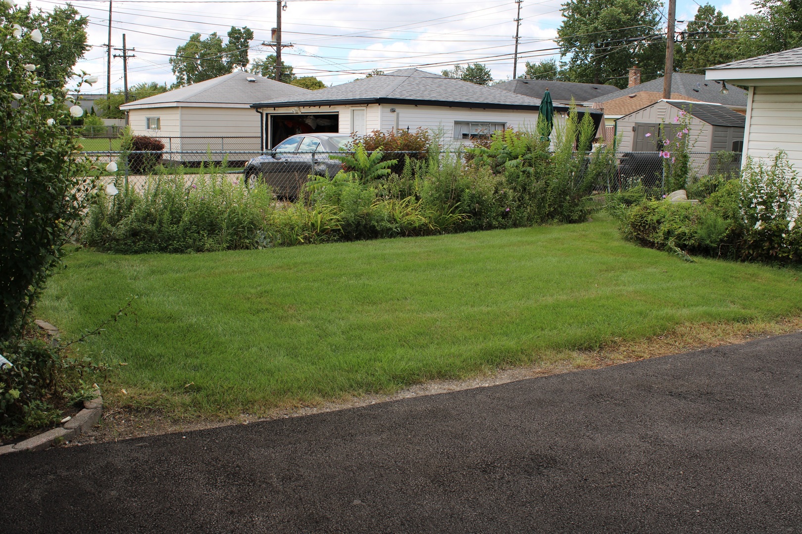 2510 South 17th Avenue Broadview, IL 60155 - Photo 17 of 17 a view of a house with backyard and garden