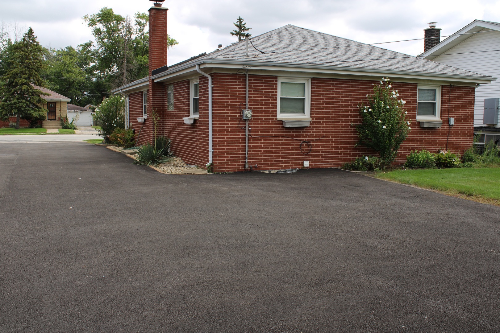 2510 South 17th Avenue Broadview, IL 60155 - Photo 2 of 17 a view of a house with a yard and plants