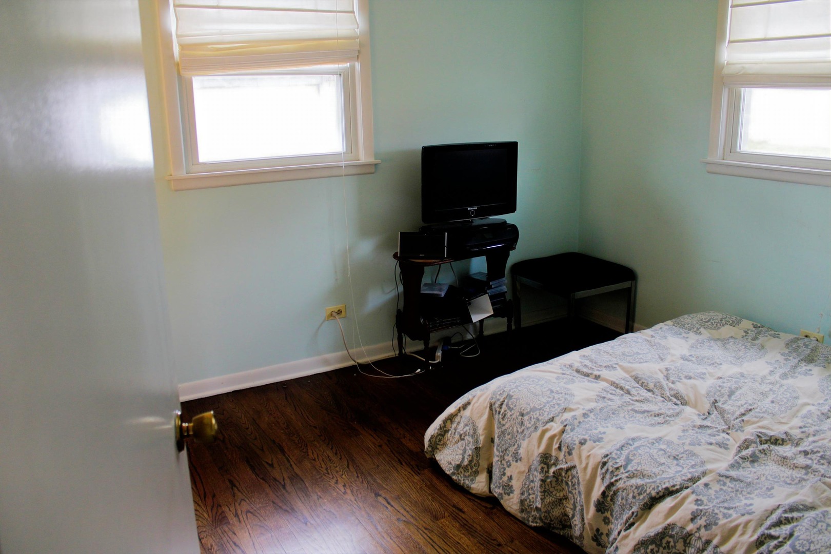 2510 South 17th Avenue Broadview, IL 60155 - Photo 9 of 17 a bedroom with a bed and a window