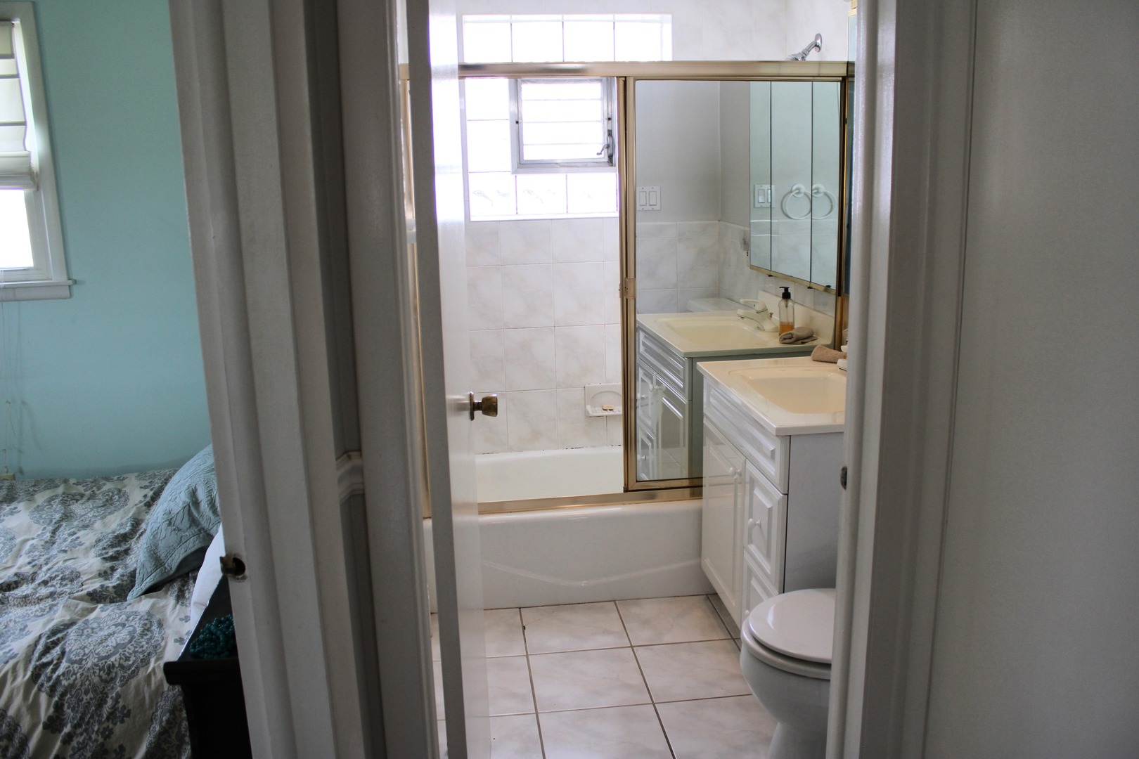 2510 South 17th Avenue Broadview, IL 60155 - Photo 10 of 17 a bathroom with a granite countertop sink a toilet and shower