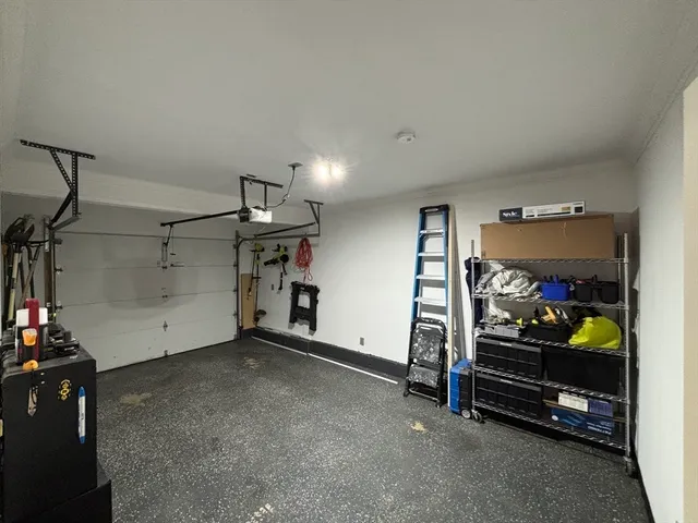a view of an empty room with gym equipment