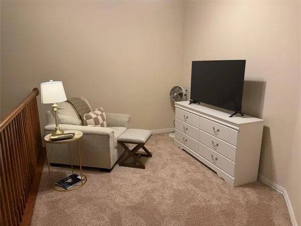 a view of workspace with lounge chair