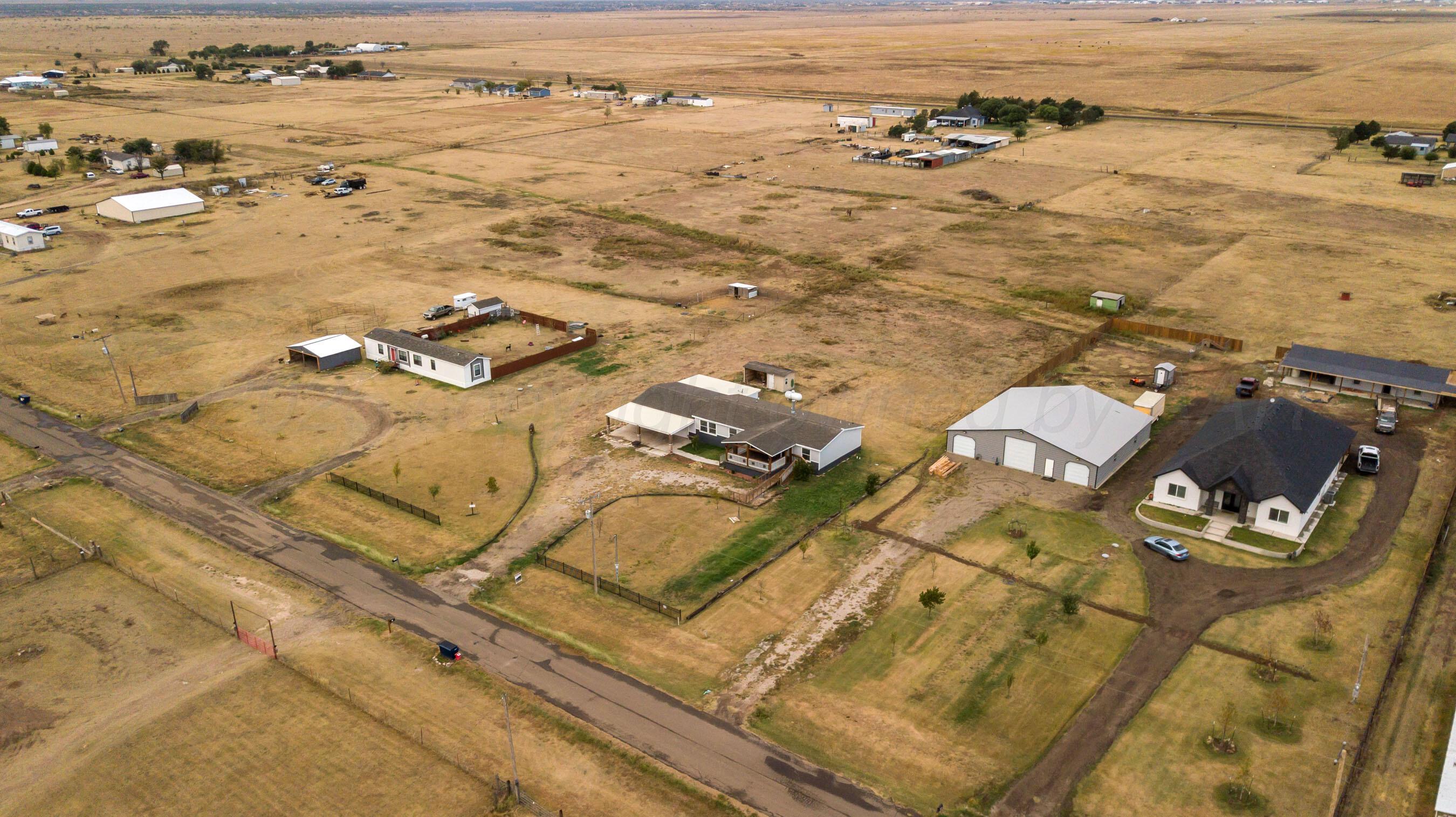 11000 Fox Street Amarillo, TX 79118 - Photo 28 of 40 an aerial view of residential houses with outdoor space