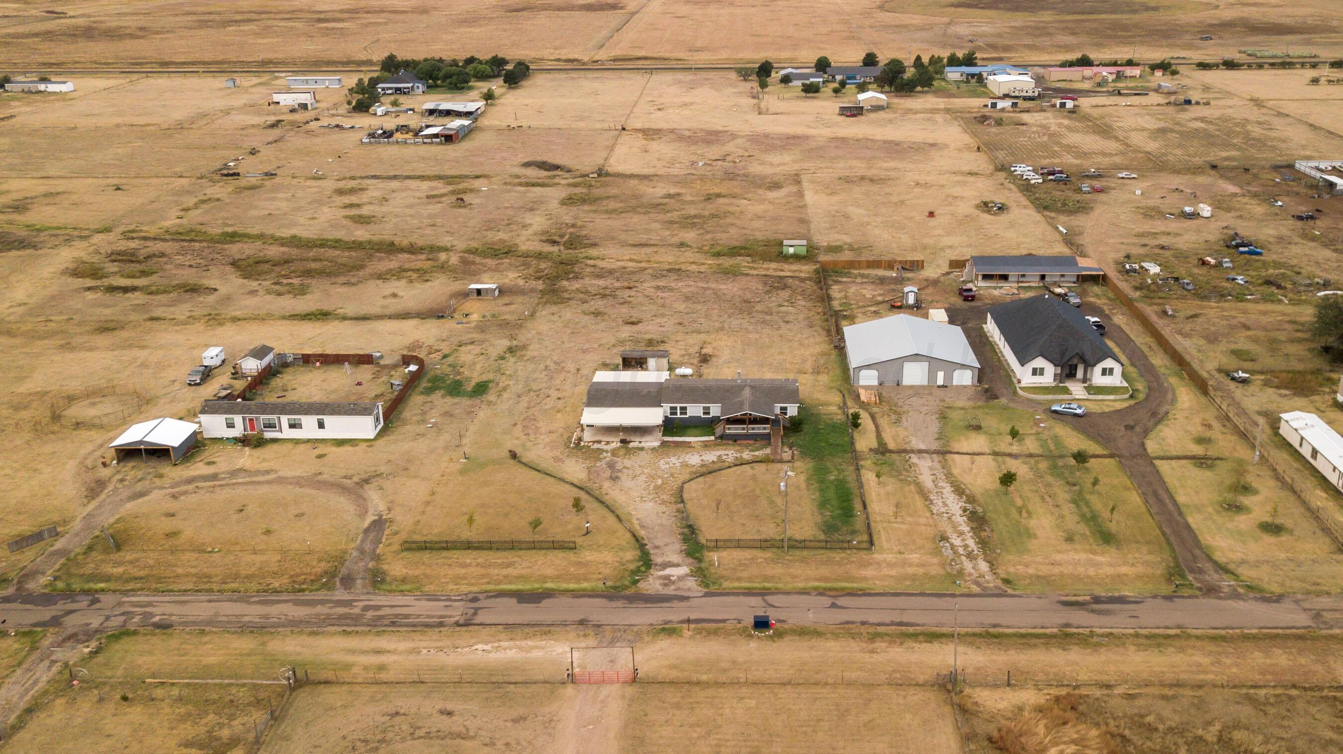 11000 Fox Street Amarillo, TX 79118 - Photo 32 of 40 an aerial view of residential houses with outdoor space