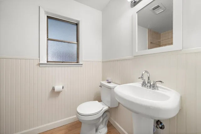 a bathroom with a sink and a toilet