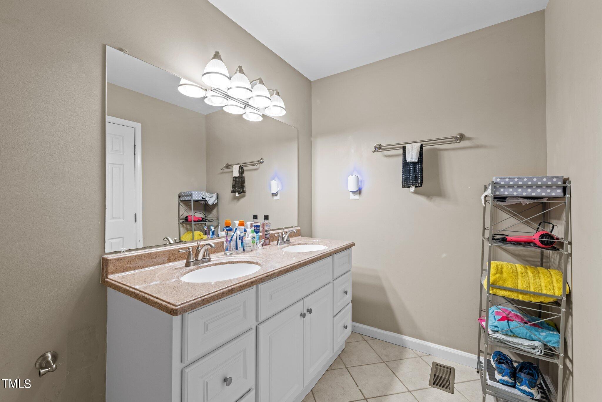 6531 New Market Way Raleigh, NC 27615 - Photo 20 of 27 primary bathroom
