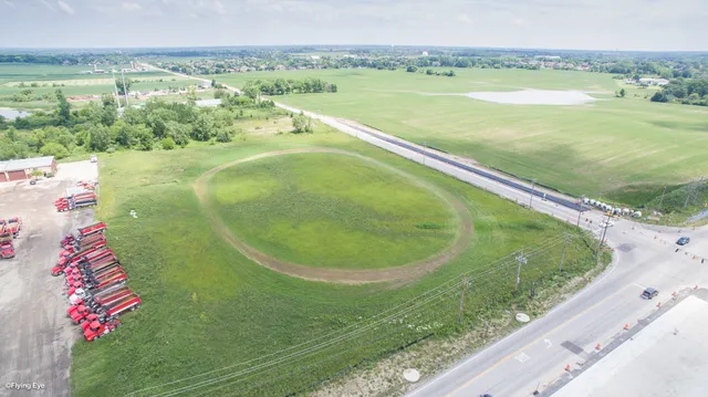 a view of a lake from a balcony