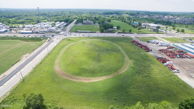 a view of a swimming pool with a lake view